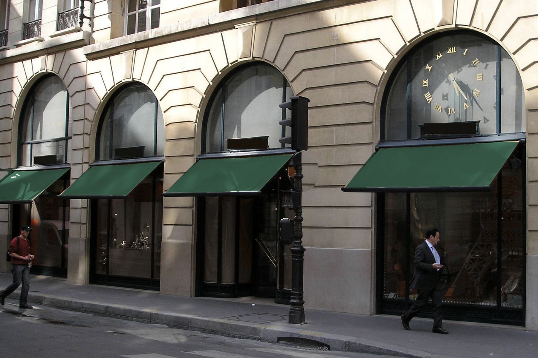 Shop windows and awnings on a Paris shopping street